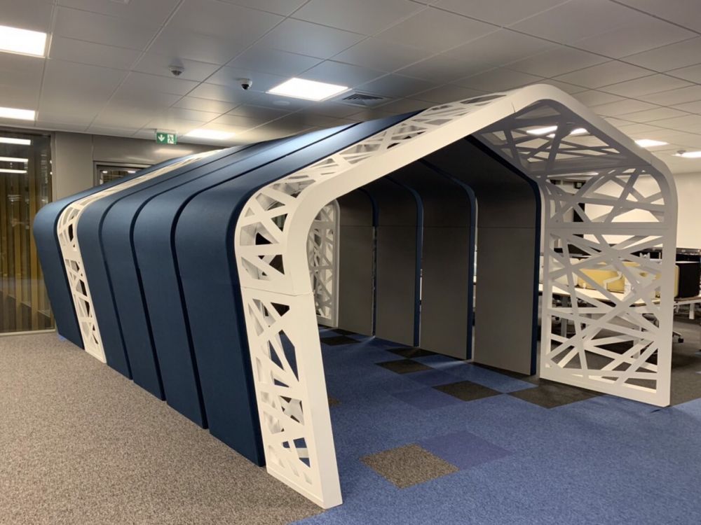 Custom acoustic treatment of an open-plan IT office