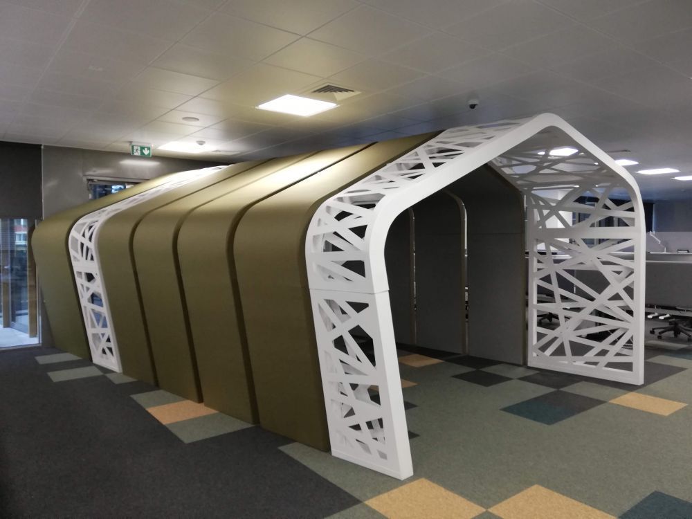 Custom acoustic treatment of an open-plan IT office