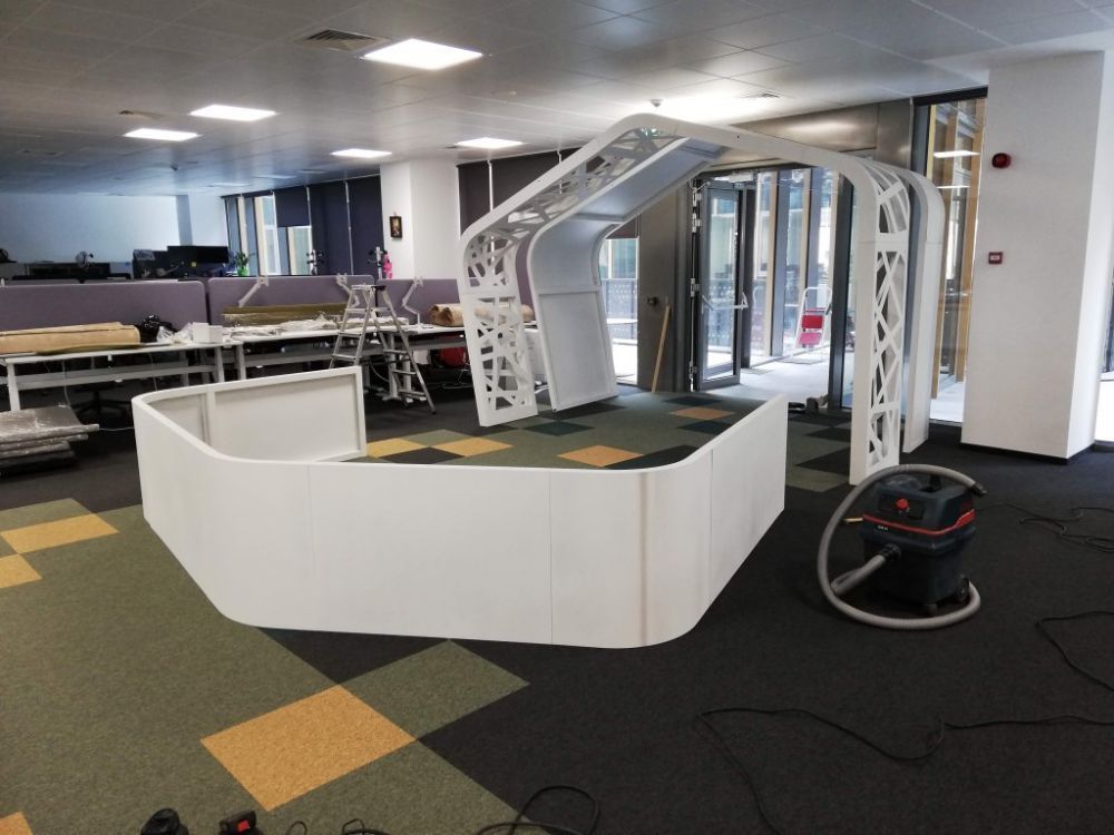 Custom acoustic treatment of an open-plan IT office