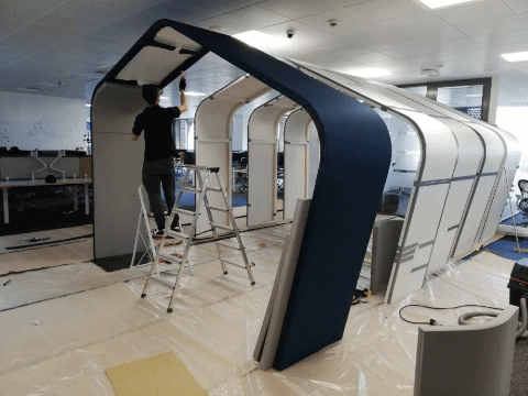 Custom acoustic treatment of an open-plan IT office