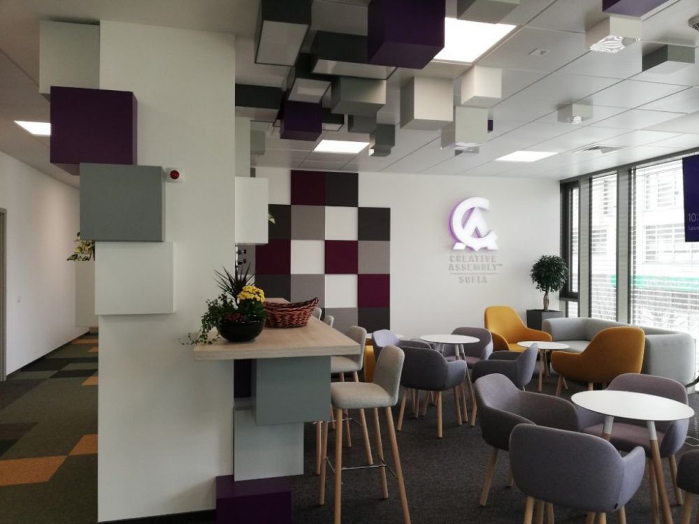 Custom acoustic treatment of an open-plan IT office