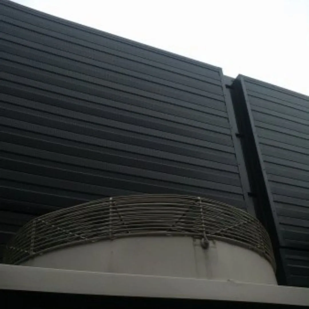 Sound-Absorbing Wall Panels Installed at Gym Near External AC Unit