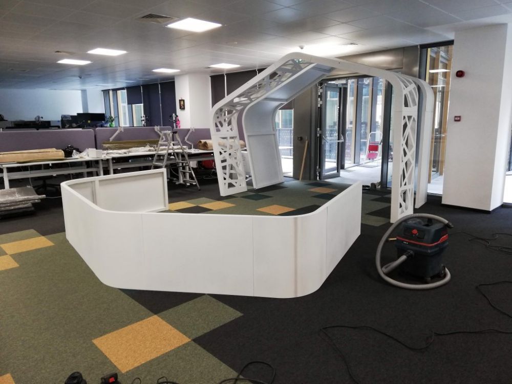 Custom acoustic treatment of an open-plan IT office