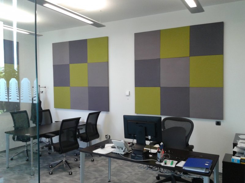 Acoustic panels in a glass-wall office